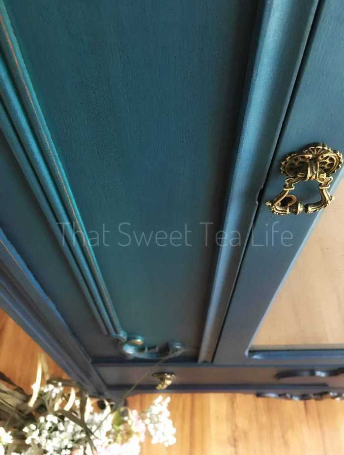 Learn How to Paint Furniture in the rustic glam finish like this door