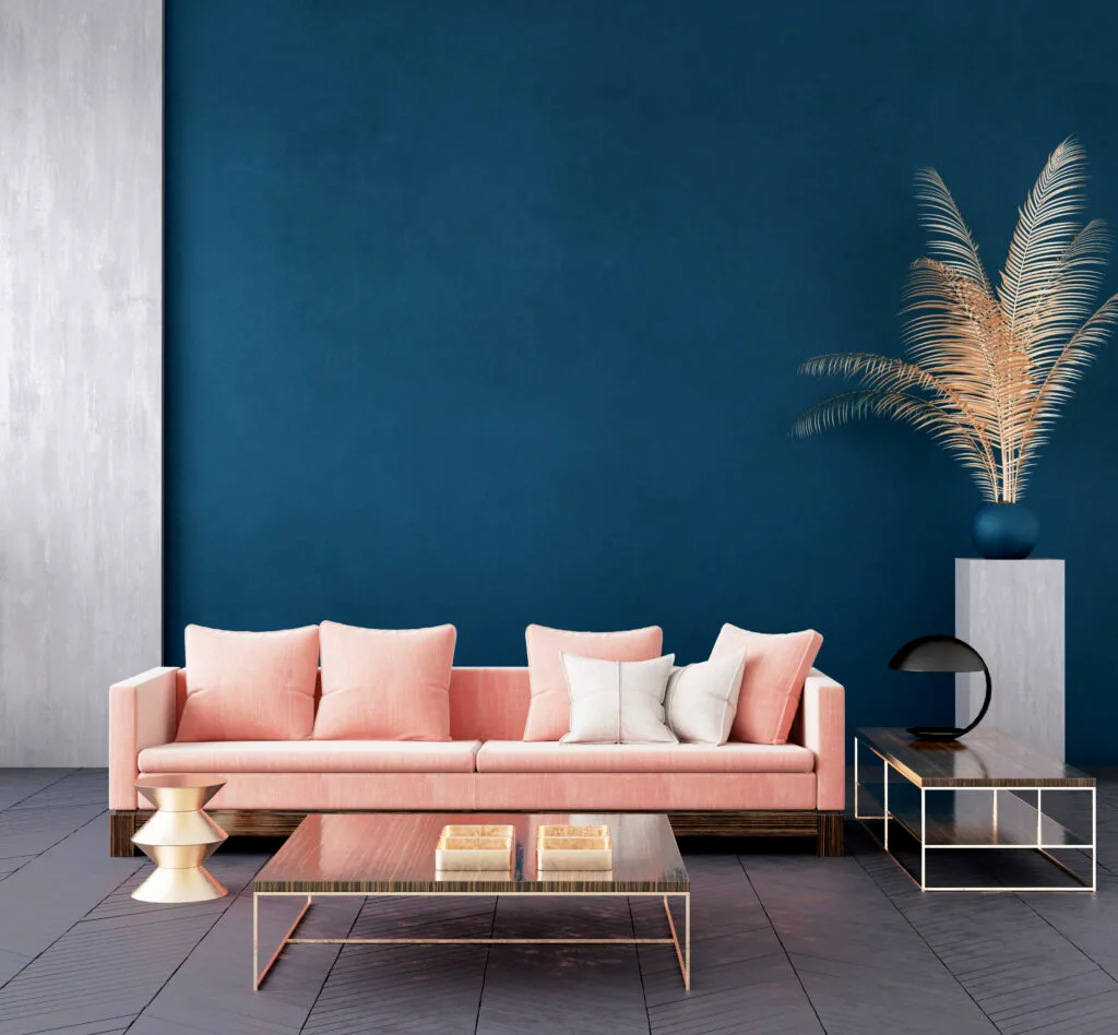 Dark blue living room with pink couch