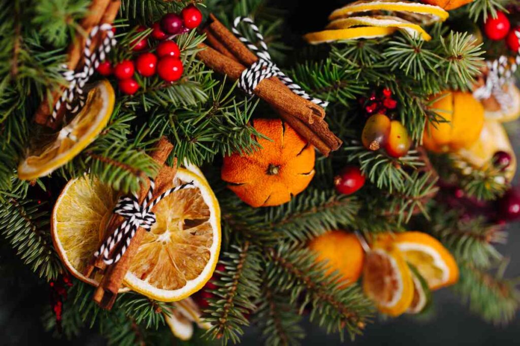 Christmas wreath with oranges and cinnamon sticks
