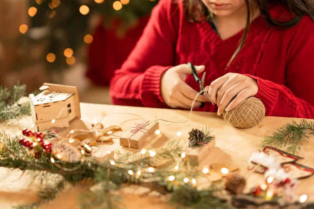 A girl making DIY Christmas Decor