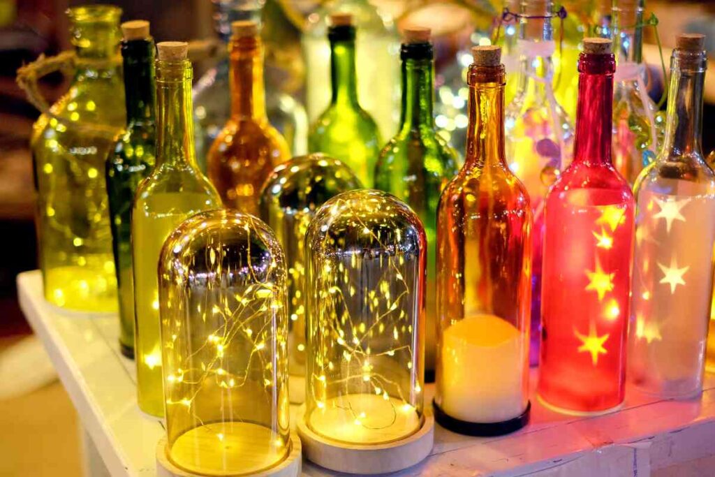 Bottles decorated with Christmas lights
