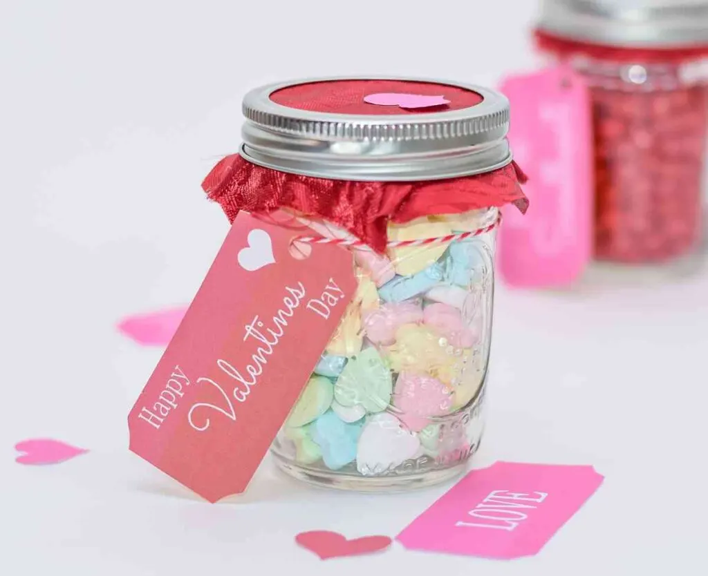 Mason jar filled with candy hearts