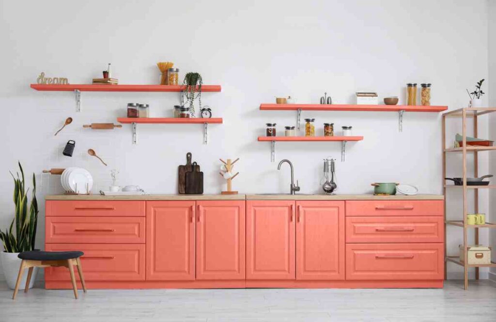 Kitchen cabinets painted a coral color