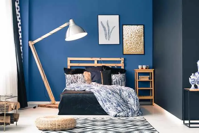 Bedroom with walls painted Royal Blue.