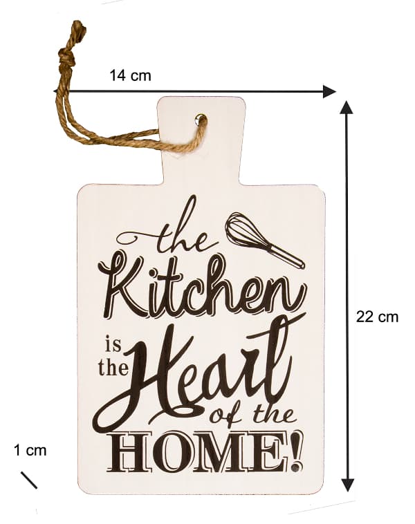 A white paddle used as farmhouse kitchen sign with the inscription "the Kitchen is the Heart of the HOME!" in dark lettering.