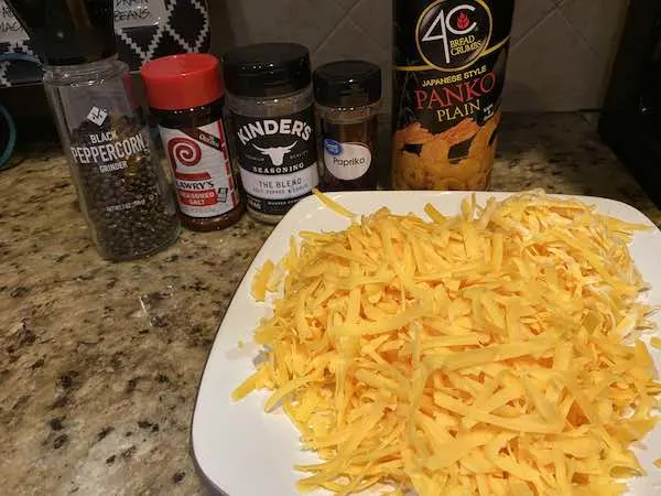 Shredded Cheddar and Colby Jack Cheese along with seasonings and bread crumbs.