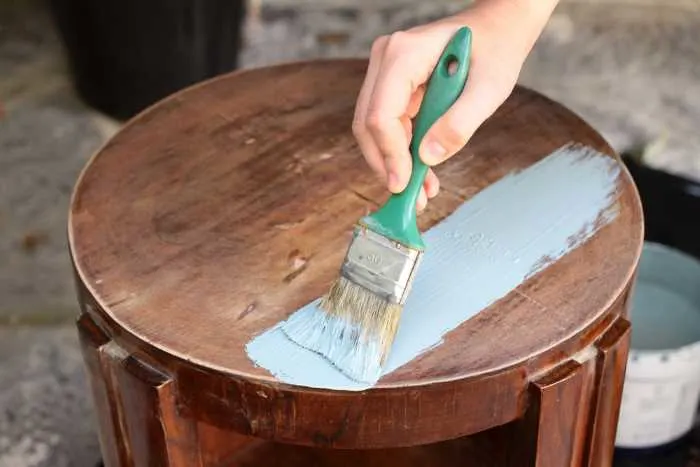painting a table with chalk paint