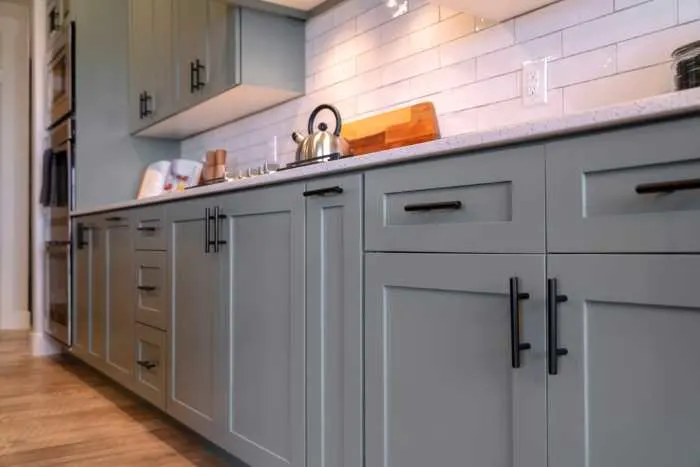 dark gray painted kitchen cabinets