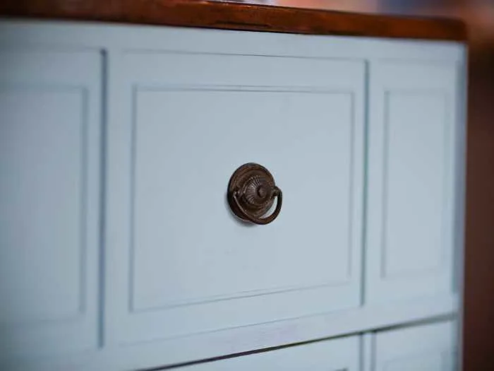 white dresser painted with Krylon Chalky Finish paint