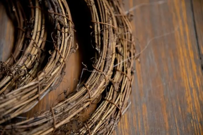grapevine wreaths waiting to be painted with teal chalk paint.