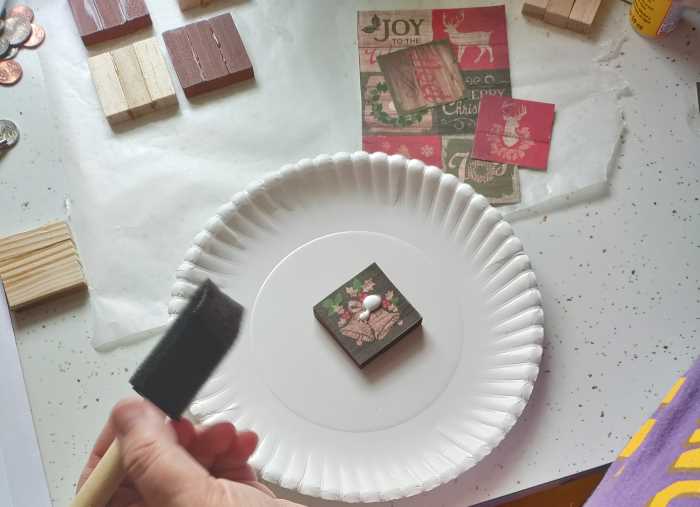 apply Mod Podge to the top of the ornament as well. 