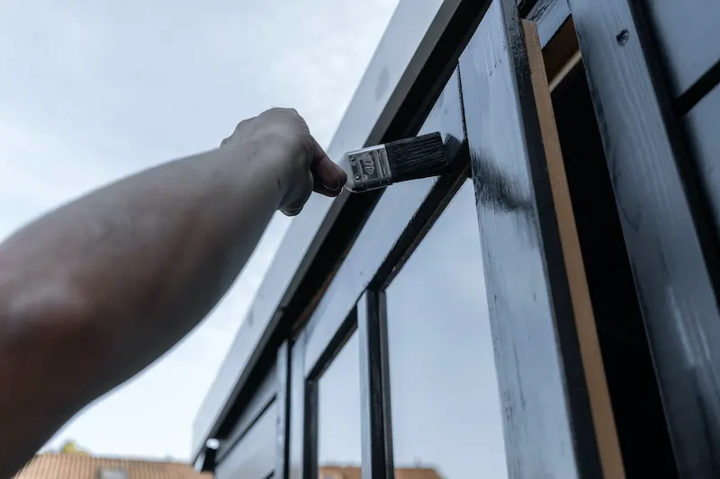 Painting window trim black.