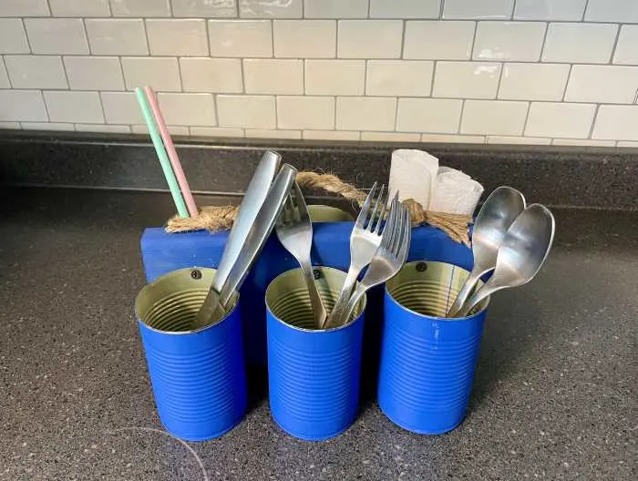 finished utensil holder with cutlery in it.