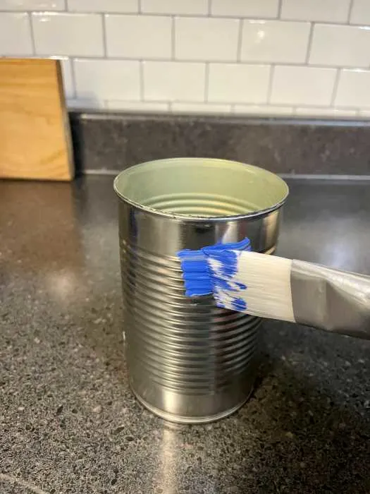 painting the exterior of the can