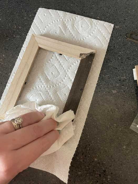 wipe any extra paint from the frame so it is even