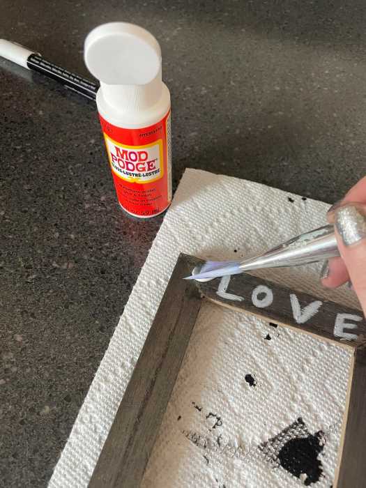Use Mad Podge to seal the chalk pen paint