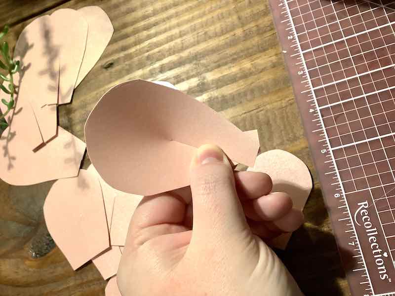 Folding over flower petals.