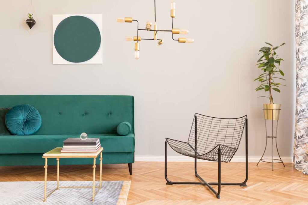 Gold accents with green couch