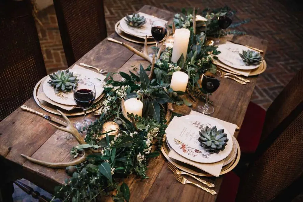 Table decorated with Greenery