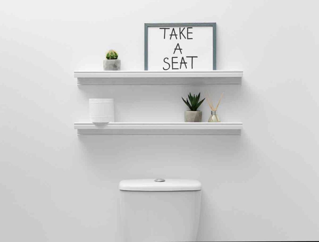 Funny Sign over a Toilet