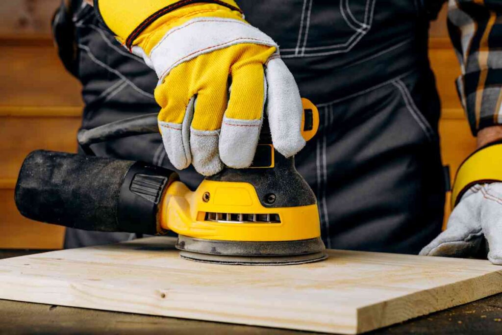 sanding wood with a cordless sander