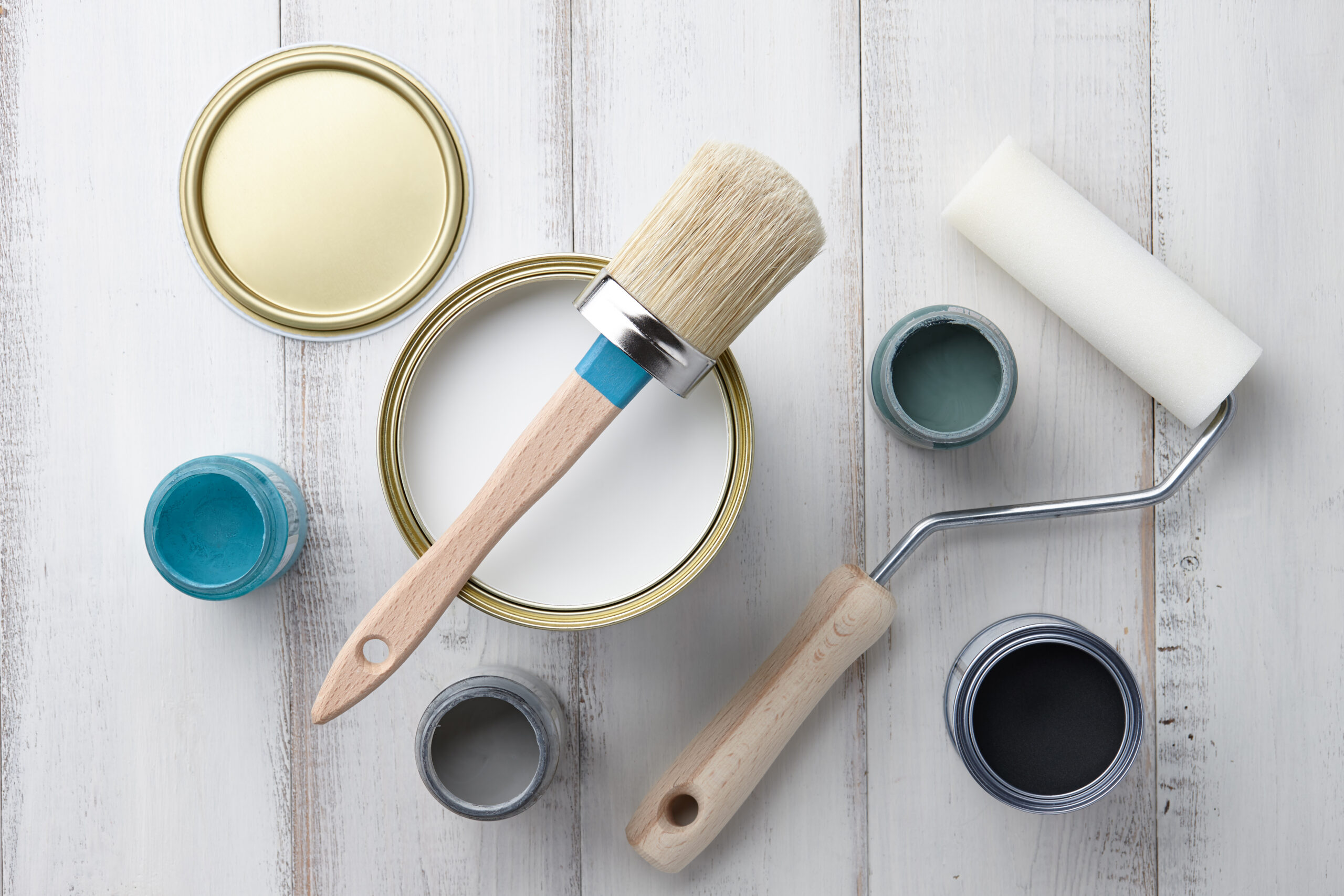 Chalk paint colors for furniture sample colors, brush and roller on a white background