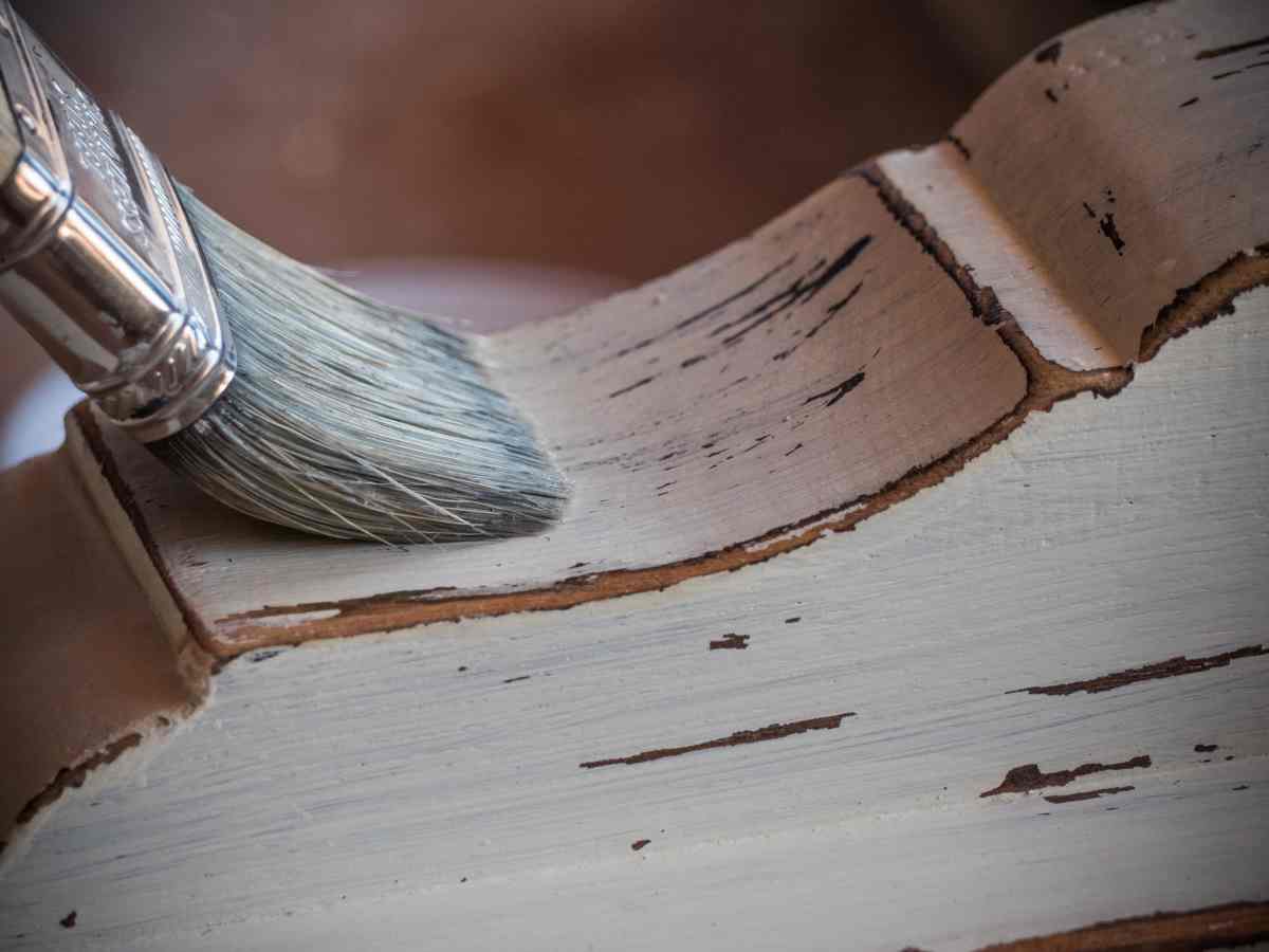 Using a paintbrush for how to seal painted furniture
