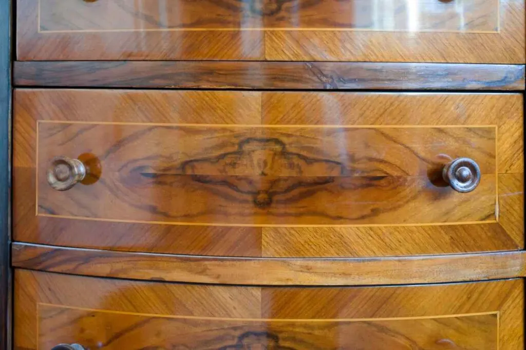 Wooden dresser with shiny wax coating