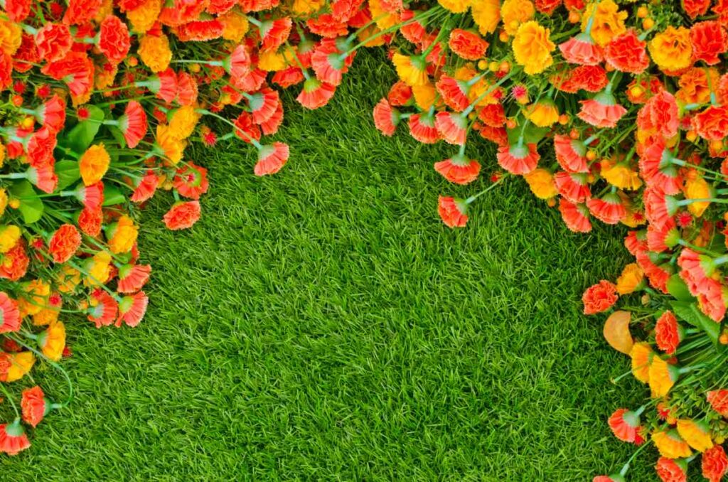 wall hanging with fake grass and flowers