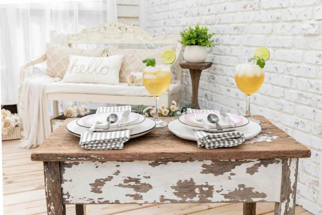 Shabby chic distressed table in a white room