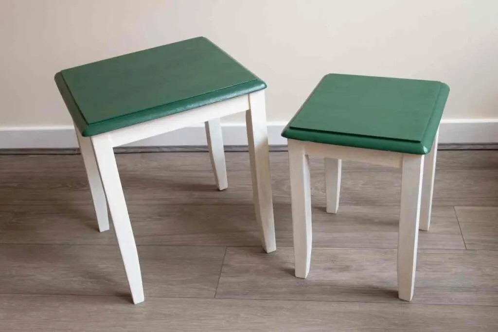 Two side tables painted green with white legs