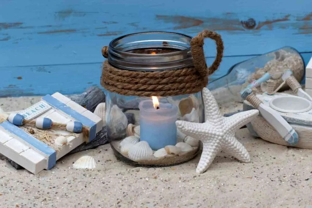 Beach themed candle holder with starfish and shells