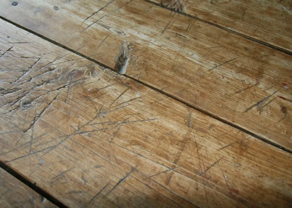 Distressed wooden table top