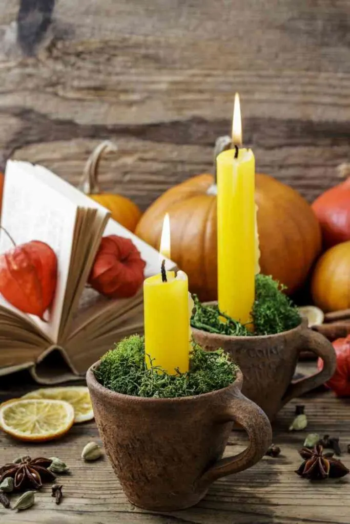 Brown coffee cups for yellow taper candle holders