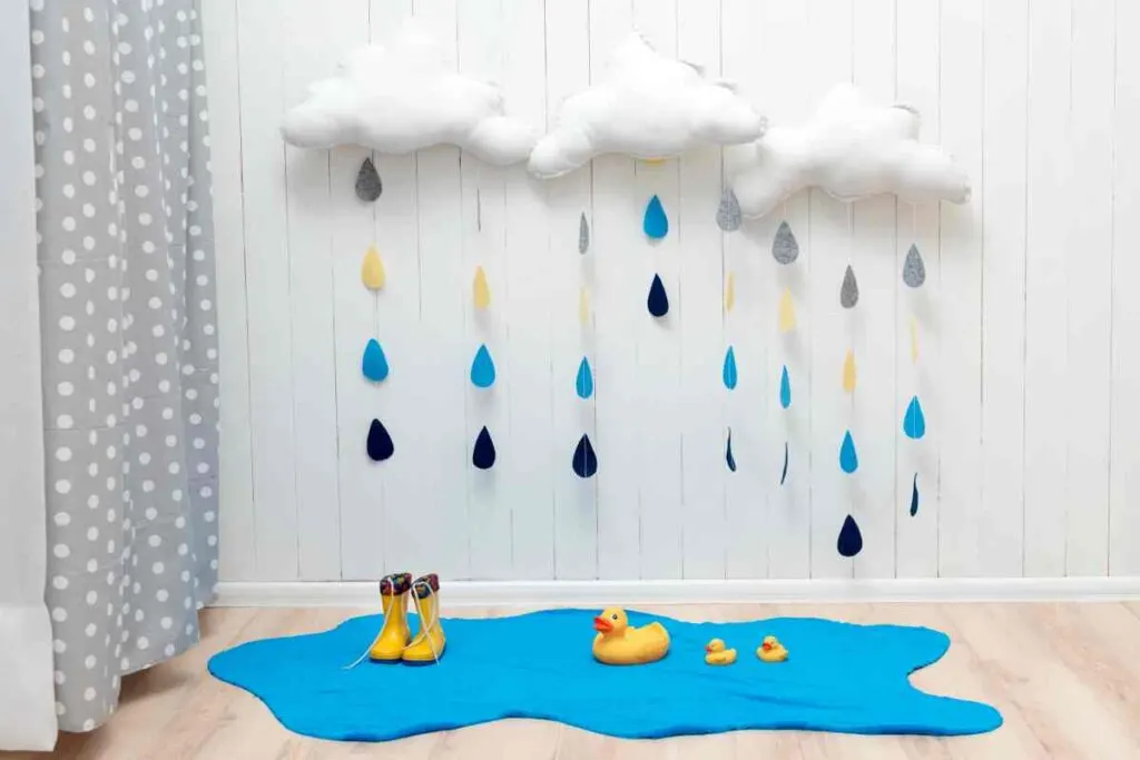 DIY wall art. clouds and raindrops with rainboots and rubber ducks