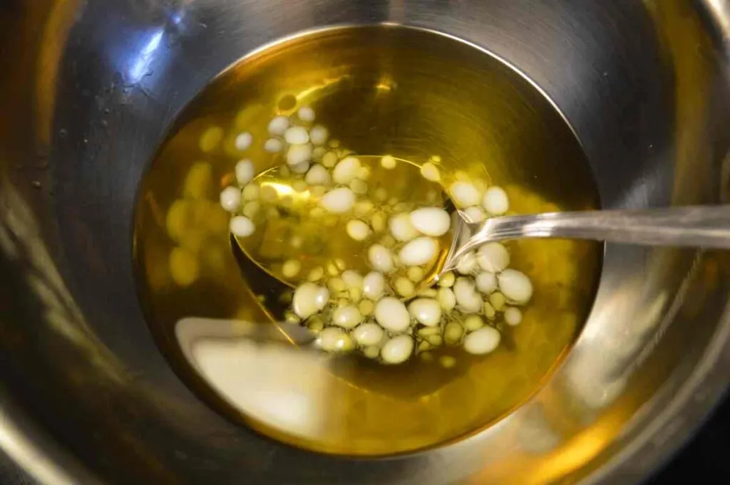 Melting beeswax in a double boiler