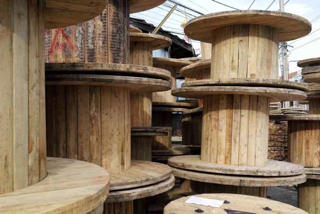 A stack of wooden electric spools