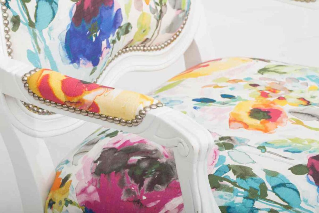White accent chair with floral seat and back