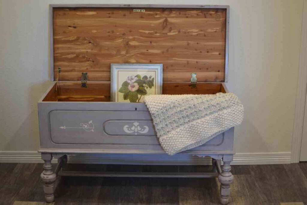 Cedar chest painted grey with white stencil designs
