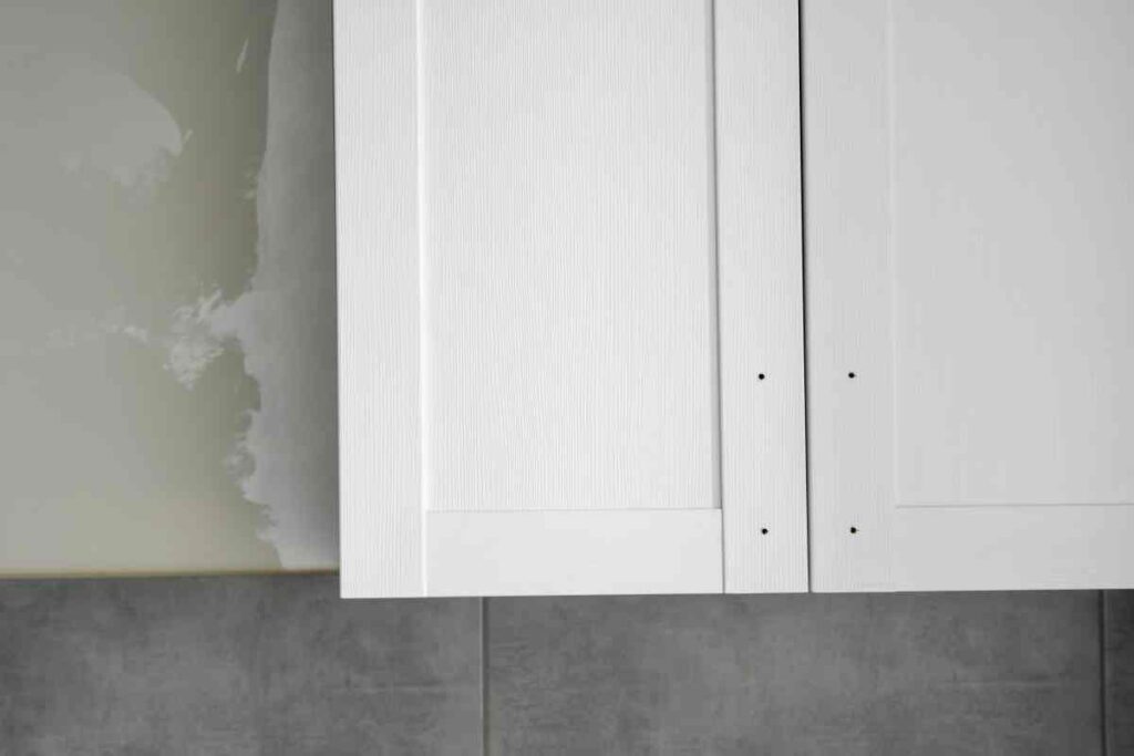 Particle board cabinets painted white