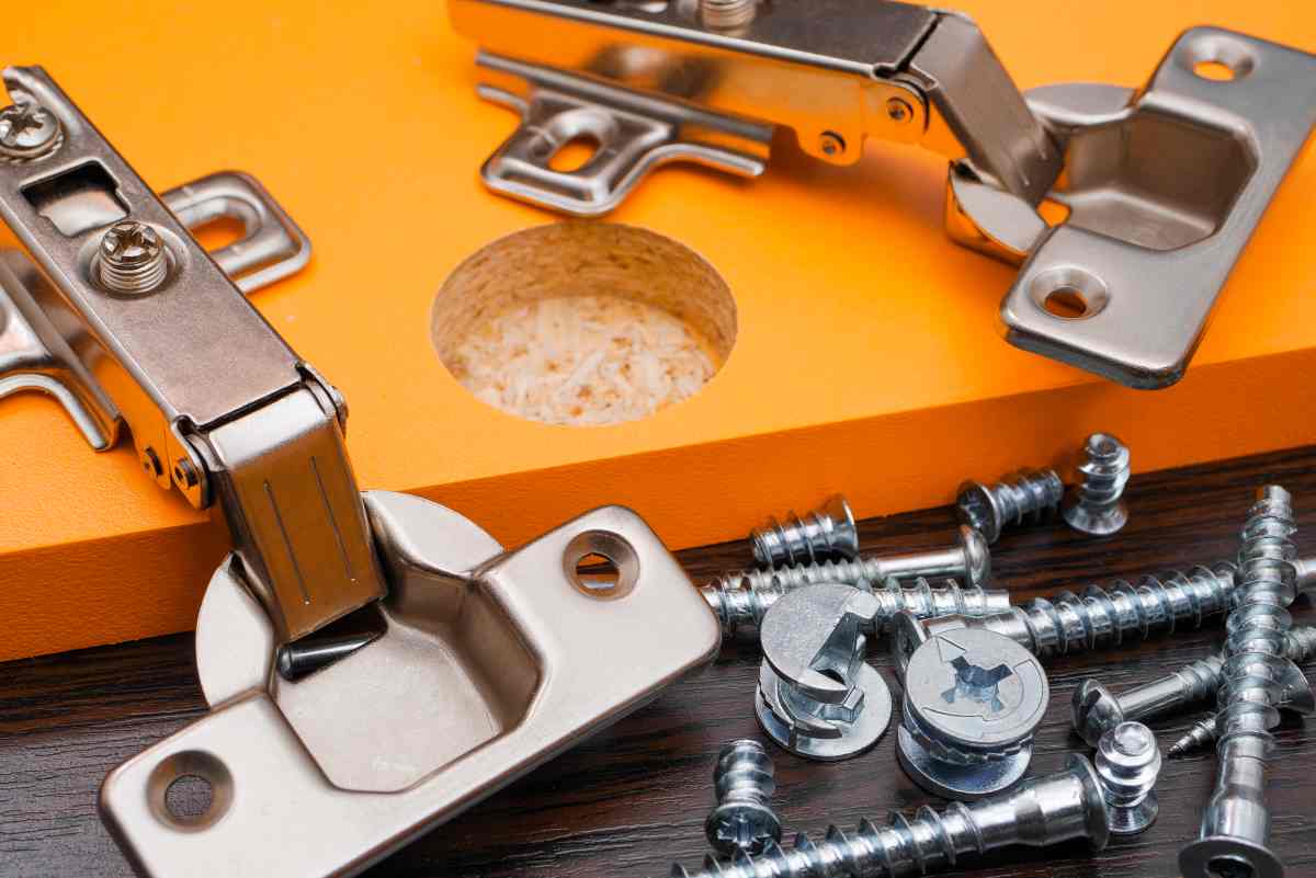 Hardware removed before painting particle board furniture orange