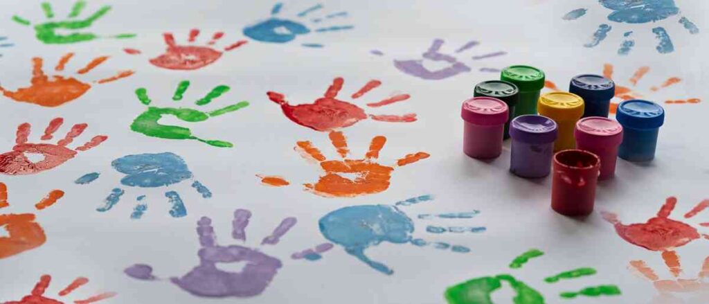 Kids handprint crafts with different color paints