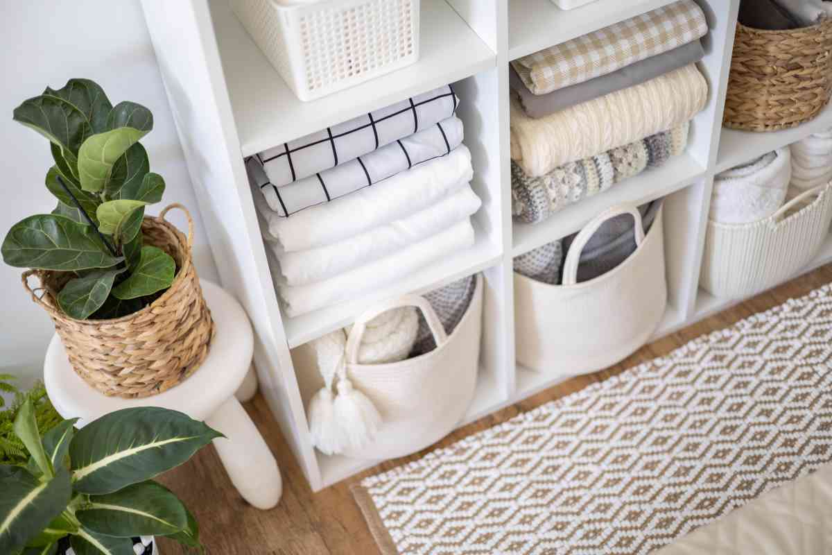 A plain white shelving unit before painting Ikea furniture