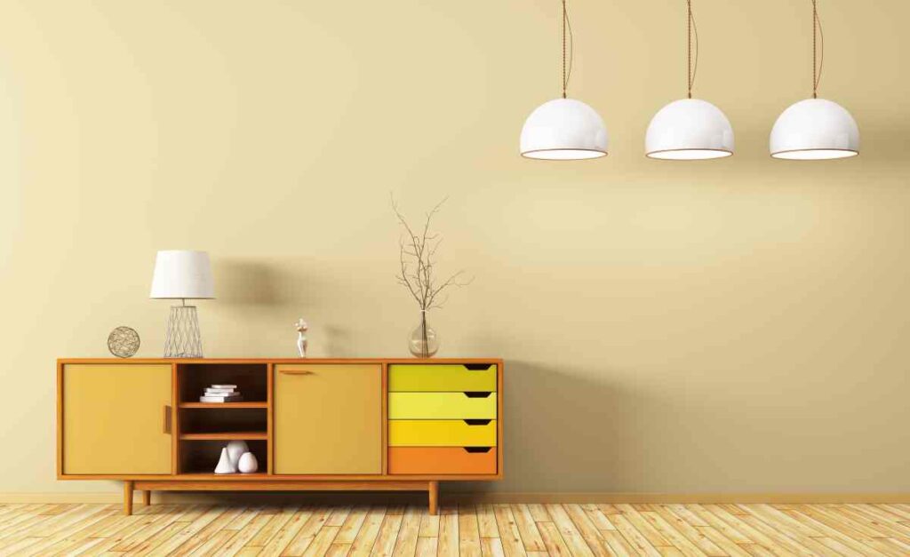 A side table painted in yellows and oranges