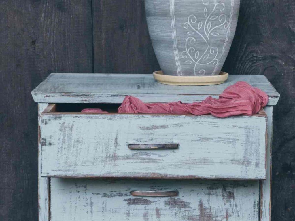 Vintage dresser with blue distressed paint style
