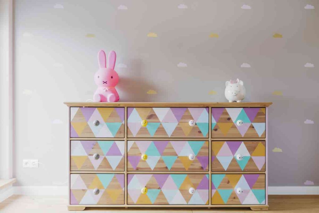 Dresser painted with colorful diamond shapes