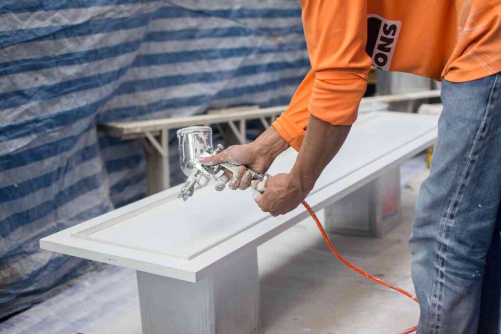 Using a paint sprayer to paint cabinets white