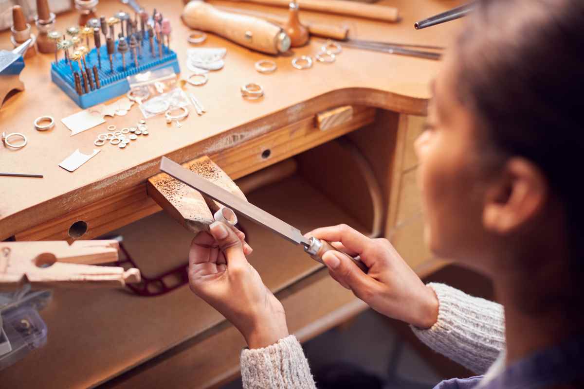 Woman working at a jewelers bench