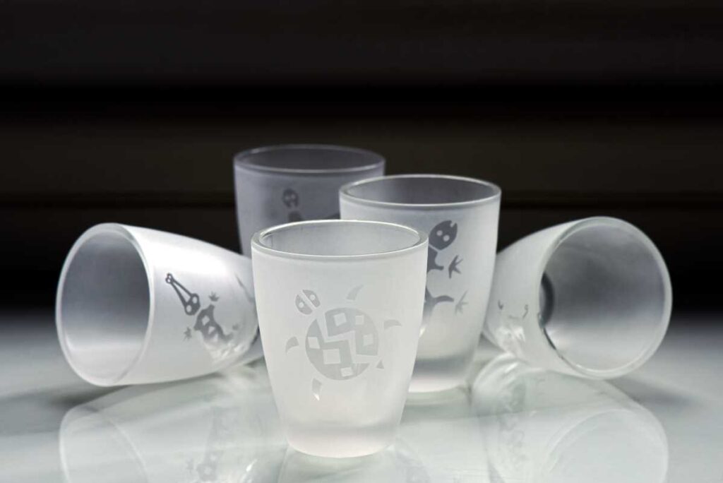 A set of etched shot glasses