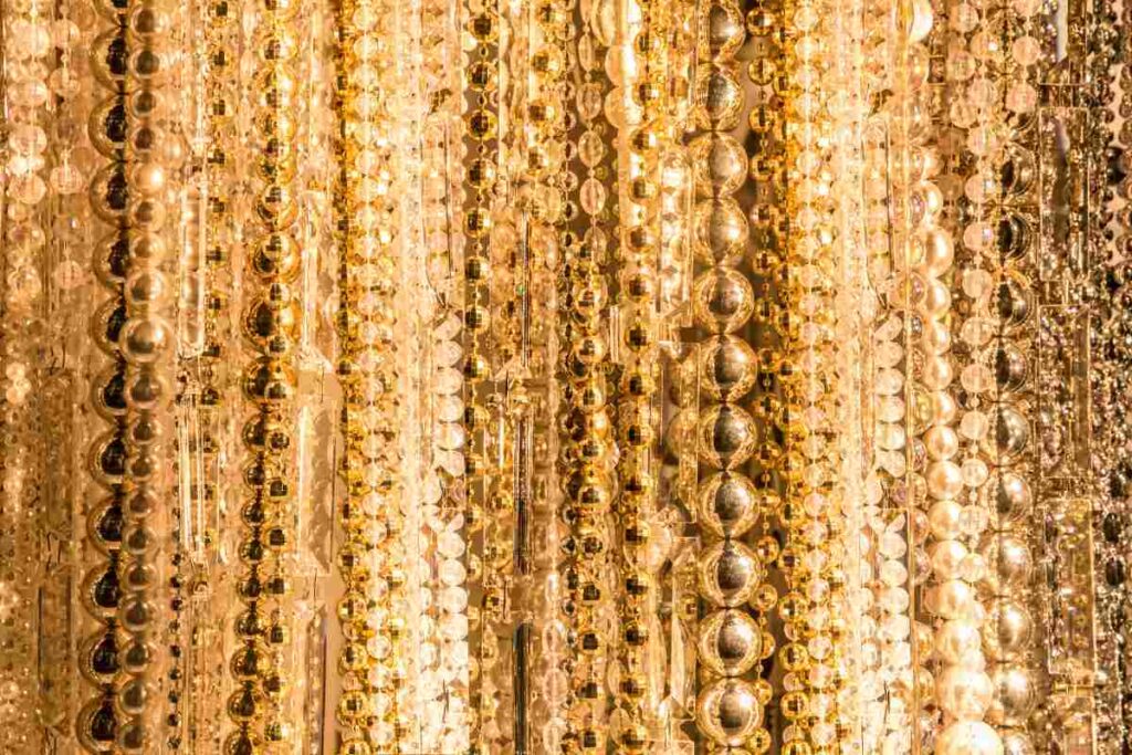 Several strands of gold beads in various sizes